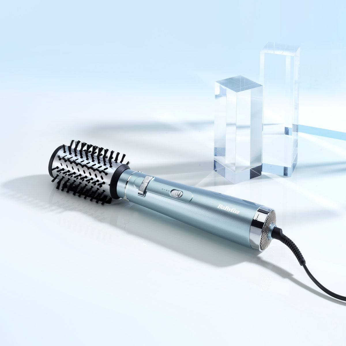 Hydro-Fusion Air Styler on a light blue background